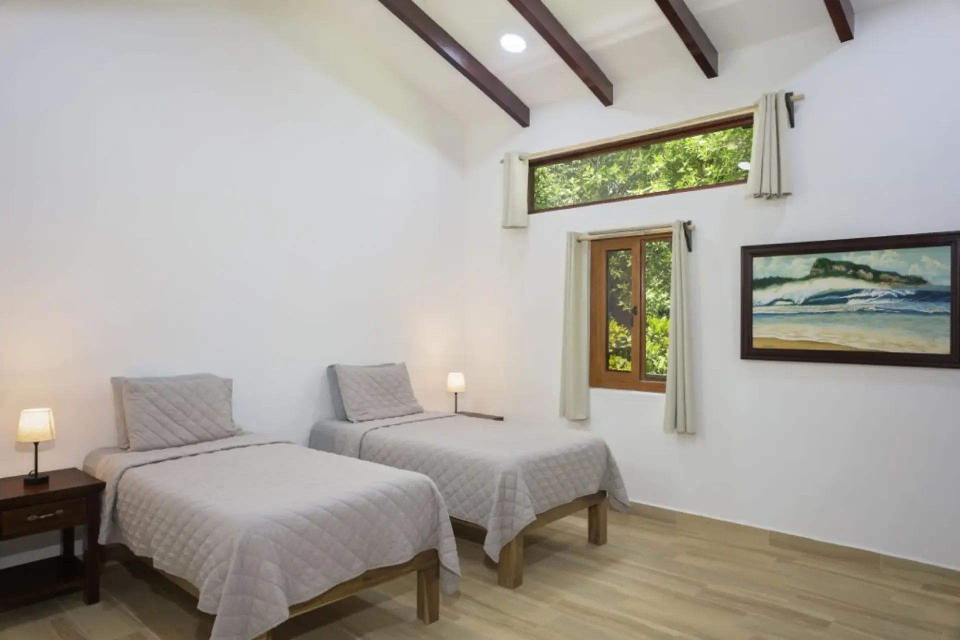 Two twin beds in the Hideaway Suite