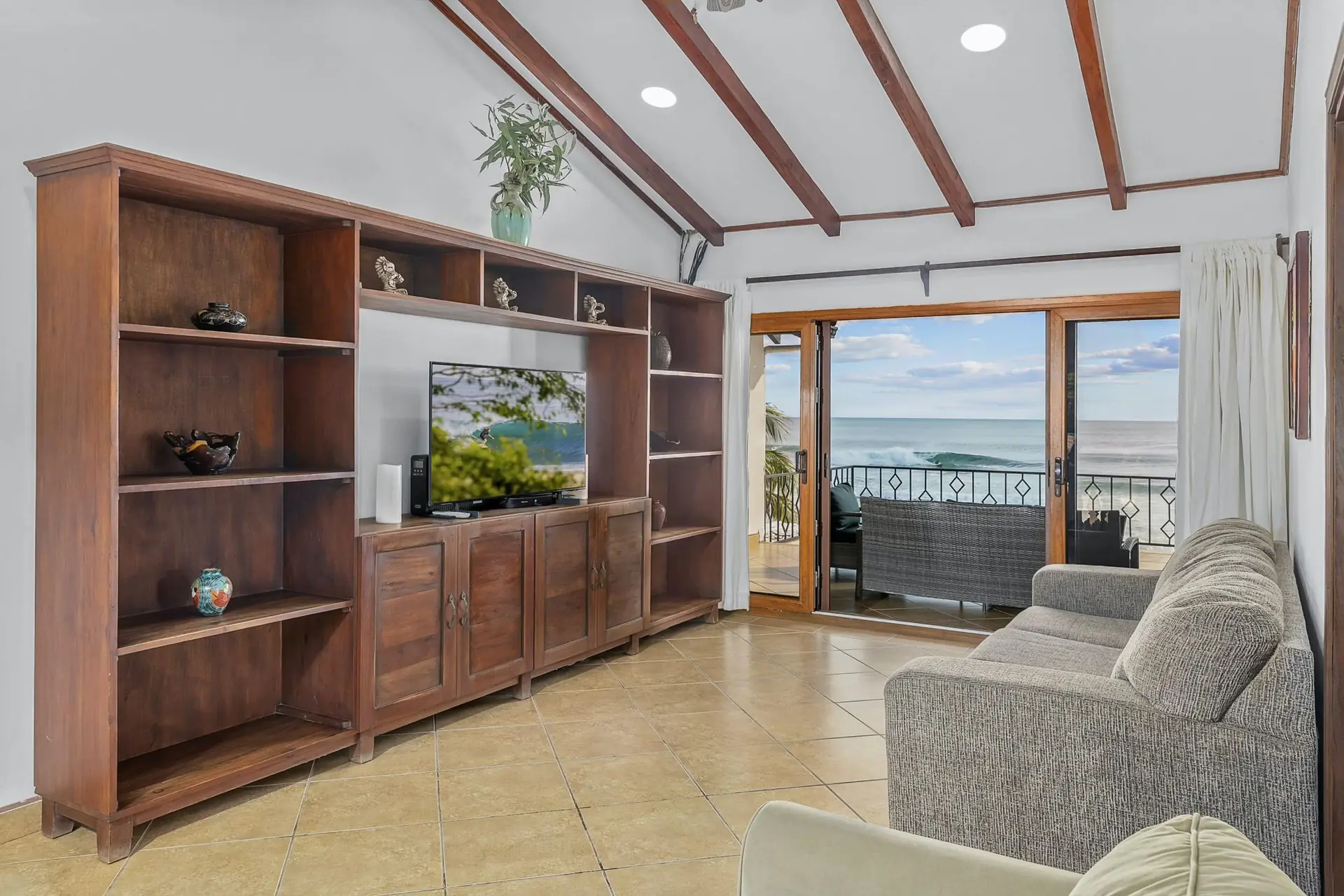 Upper-floor living and media area at Casa Colorados